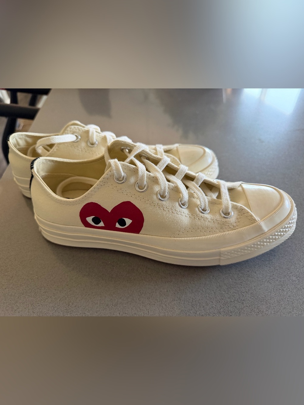 Converse Cream Low-Top Sneakers with Red Heart Graphic